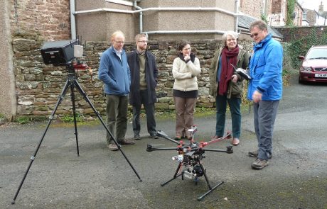 Historic England's team with the drone they used to photograph 33a Chapel St before works began