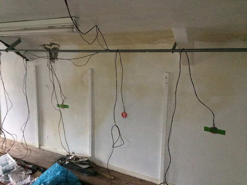 Equipment to measure humidity levels before stripping out began - installed by Historic England