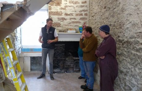 Chris Morphet shows local people around 33a Chapel Street during CAfS Cumbria Green Build Festival