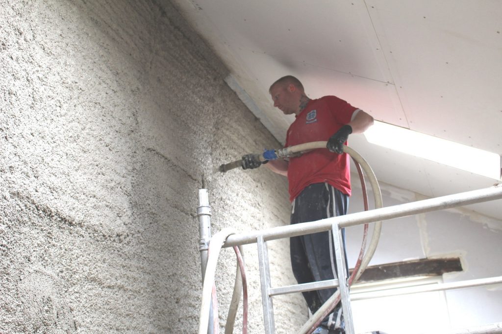 Spraying Diathonite Evolution - Ecological Building Systems