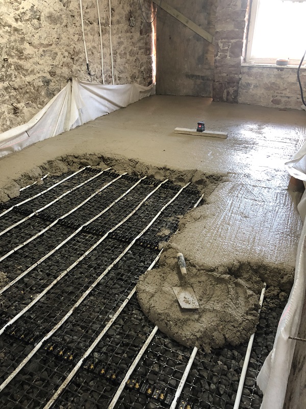 Underfloor heating pipes and limecrete floor at 33a Chapel St