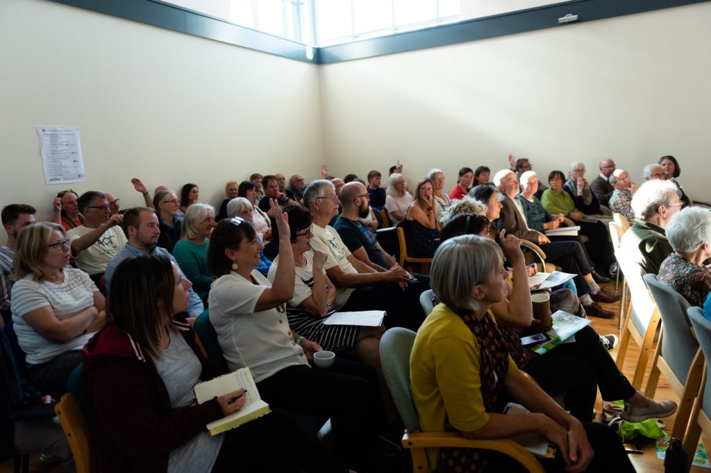 Attendees at Climate Emergency Action Summit take part in discussions