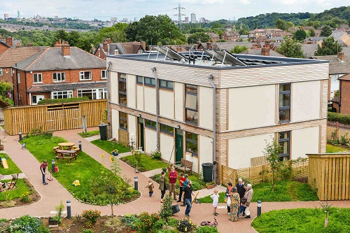 Residents enjoying the inspirational LILAC community housing development in Leeds. Photo: Andy Lord