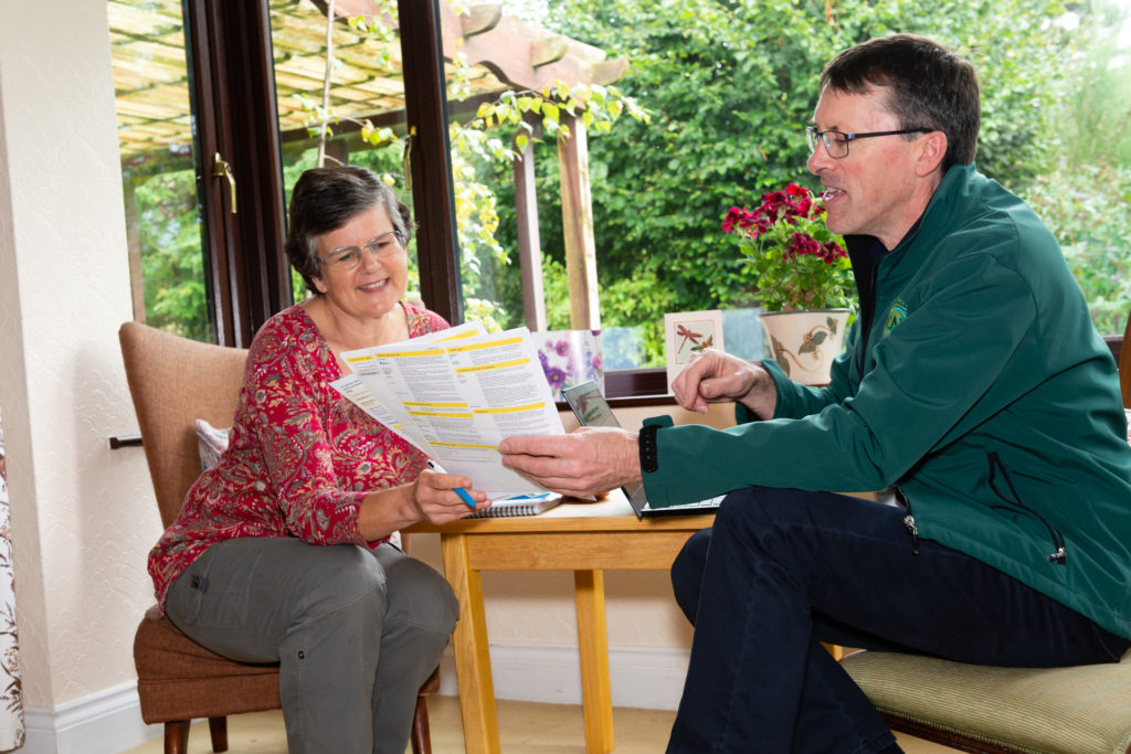 Andrew helping a client with energy usage