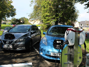 Two nissan leafs charging at a charge my street chargepoint