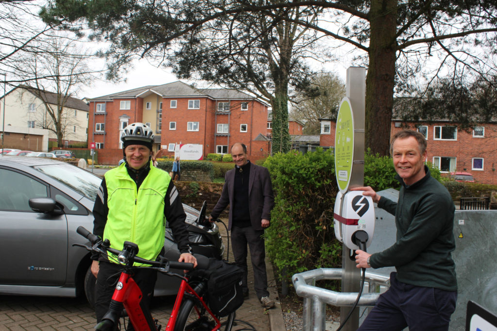 Penrith chargepoint with three people