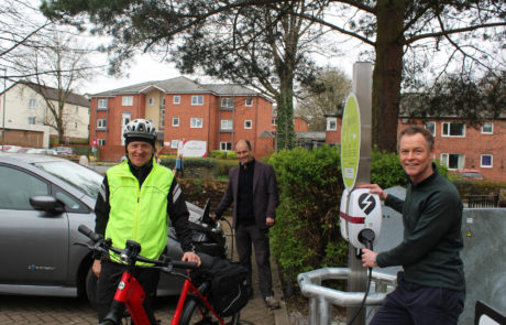 Penrith chargepoint with three people