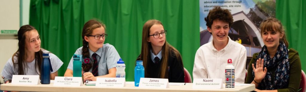 Young climate activists on a panel