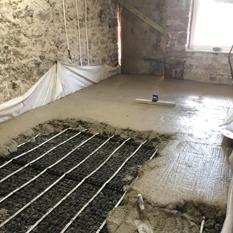 The floor of a house mid-way through the retrofit