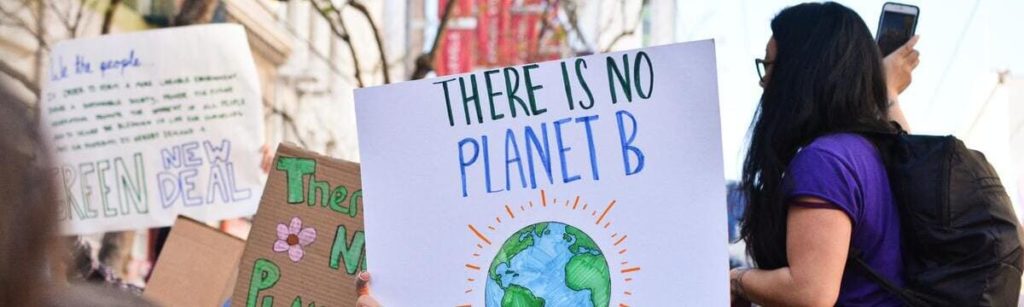 Young people with placards